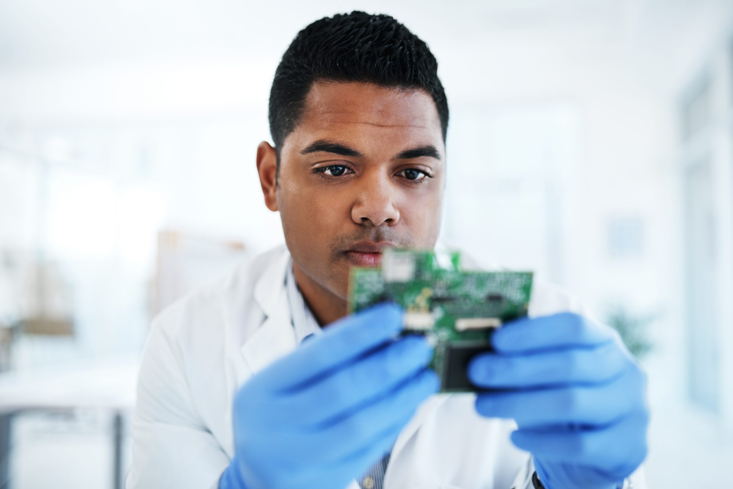 Technology,,Motherboard,And,Man,In,Lab,With,Hardware,For,Maintenance,