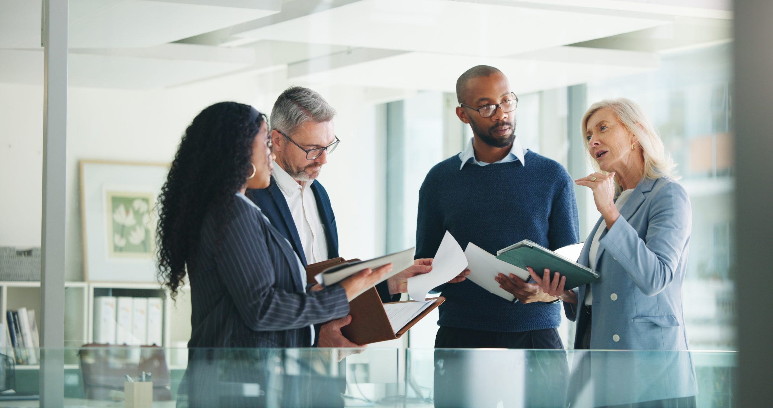 Business,,Documents,And,People,With,Meeting,Discussion,For,Finance,Trends,